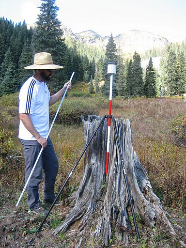Jeff Deems places reflector for LIDAR survey, Swamp Angel Study Plot, September 2010